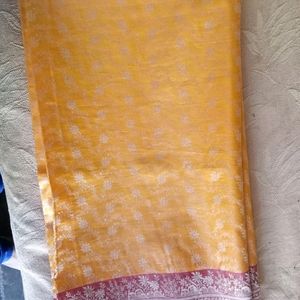 Yellow Saree With Pink Border