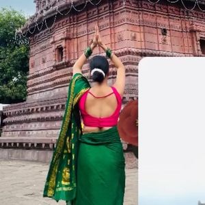 Green Saree With Pink Sleevless Blouse