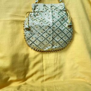 Designer small Creame colour Hand bag( ladies)