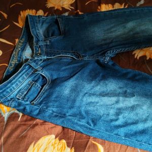 Washed Out Jeans With Obvious Flaws.