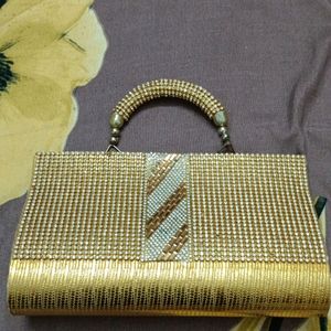 Golden Color Stone Clutch