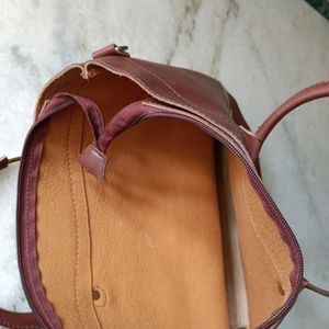 A Brown Colored Handbag