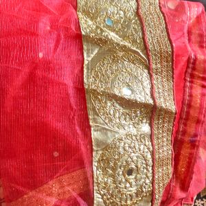 Selling Lehnga With Orange And Golden Colour