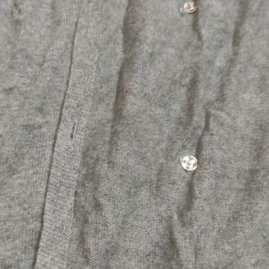 Grey Shrug With Frill Type Design