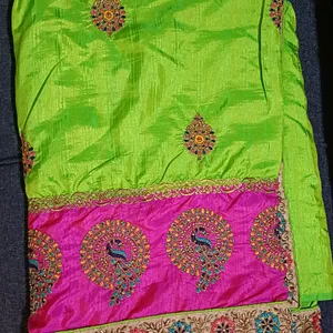 Vibrant Saree with Intricate Peacock Embroid