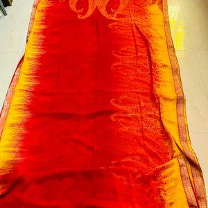 Orange Col Chiffon Saree With Golden Border