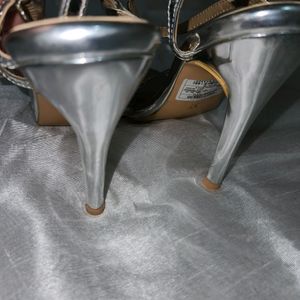 Silver Stilletos