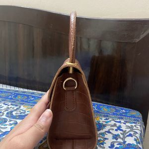 Brown Purse And Sling Bag