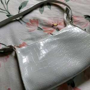 new white sling bag