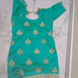 Turquoise teal color suit with Kundan