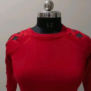 top in red colour with designer sleeves