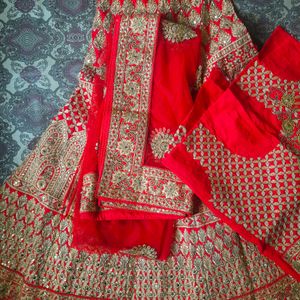 Unstiched Red And Gold Lehenga