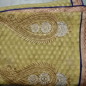 Beautiful Yellow and Blue Net Saree