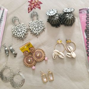 7 Pair Of Earrings And Hair Accessories