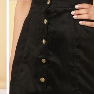 A line buttoned black skirt