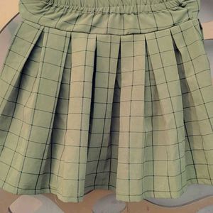 A beautiful korean style pleated skirt in oilive g