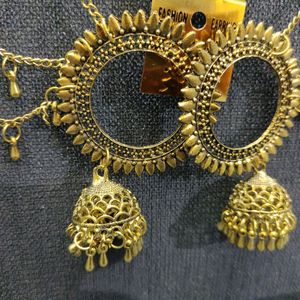 Gold tonned earrings with ear Chain