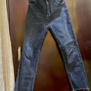 Dark Blue Raw Hem High Rise Denims.