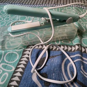 A New MINI HAIR STRAIGHTENER FOR SALE