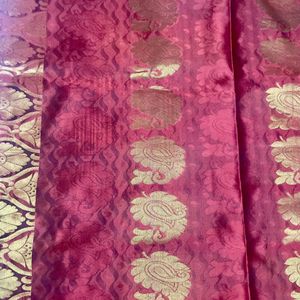 Orange kanchi Pattu Saree With Pink Pallu