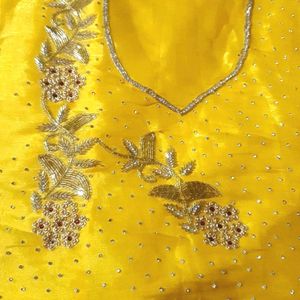 Beautiful hand work yellow saree