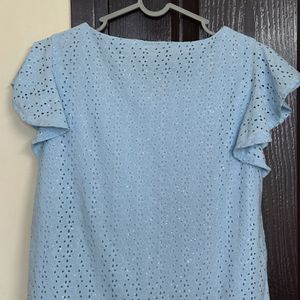 glittery blue top