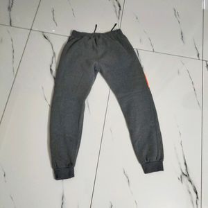 Grey ETEN joggers.