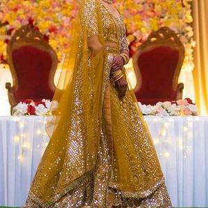 Golden Heavy Mirror Worked Lehenga