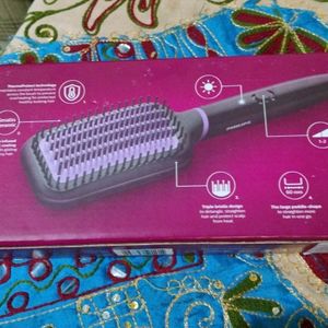 A BRAND NEW PHILIPS HAIR STRAIGHTENER.