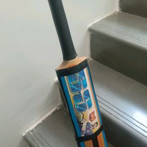 A Wooden Cricket Bat By Virat & Suryakumar