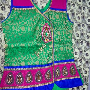 Bright Coloured Matched Blouse Top On Lehenga Set