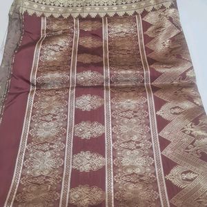 Mauve Color Saree With Golden Print Border