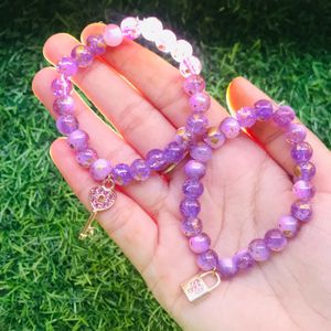 purple marble beads with cute chams.