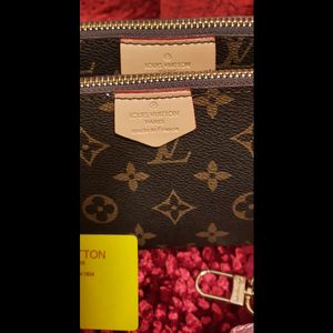 LOUIS VUITTON SLING BAG