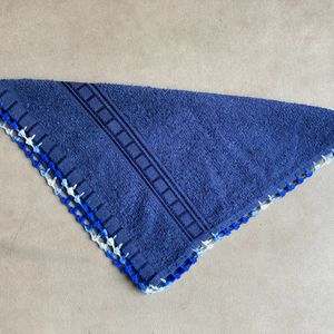 A Hand Napkin With Crochet Border