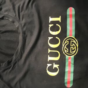 Gucci T-shirt - Size M. Not Used any time .Stretchable