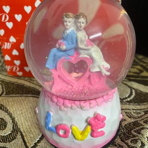 Small Couple Globe With Music Love Symbol