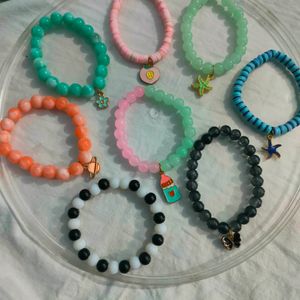 Handmade Bracelets With Glass Beads And Charms