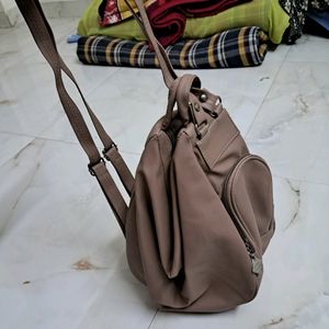 Two Way Beige Purse And Bagpack