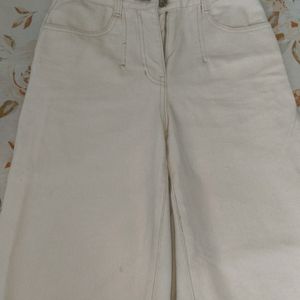 white flared jeans