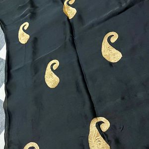 Elegant black golden border and motifs saree