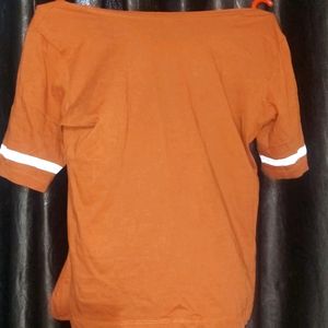 This A  Orange Colour Tshirt With Size S .