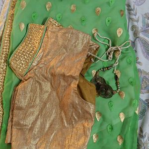 Green, Golden And Cream Saree