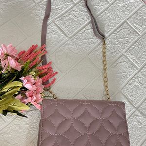 Mauve pink quilted bag