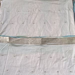 white banarasi silk saree with blue colour pallu