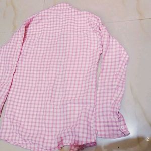 A Checked Pink Shirt.