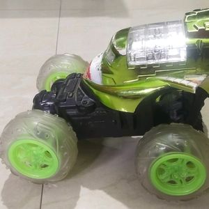 Movable Green And Black Toy Car