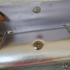 Silver Clutch with golden stones