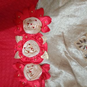 Red coloured frock with flowers