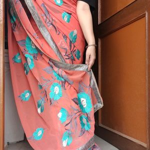 Peach Coloured Saree With Stitched Blouse